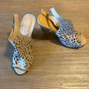 Nude strap heel. Like new.